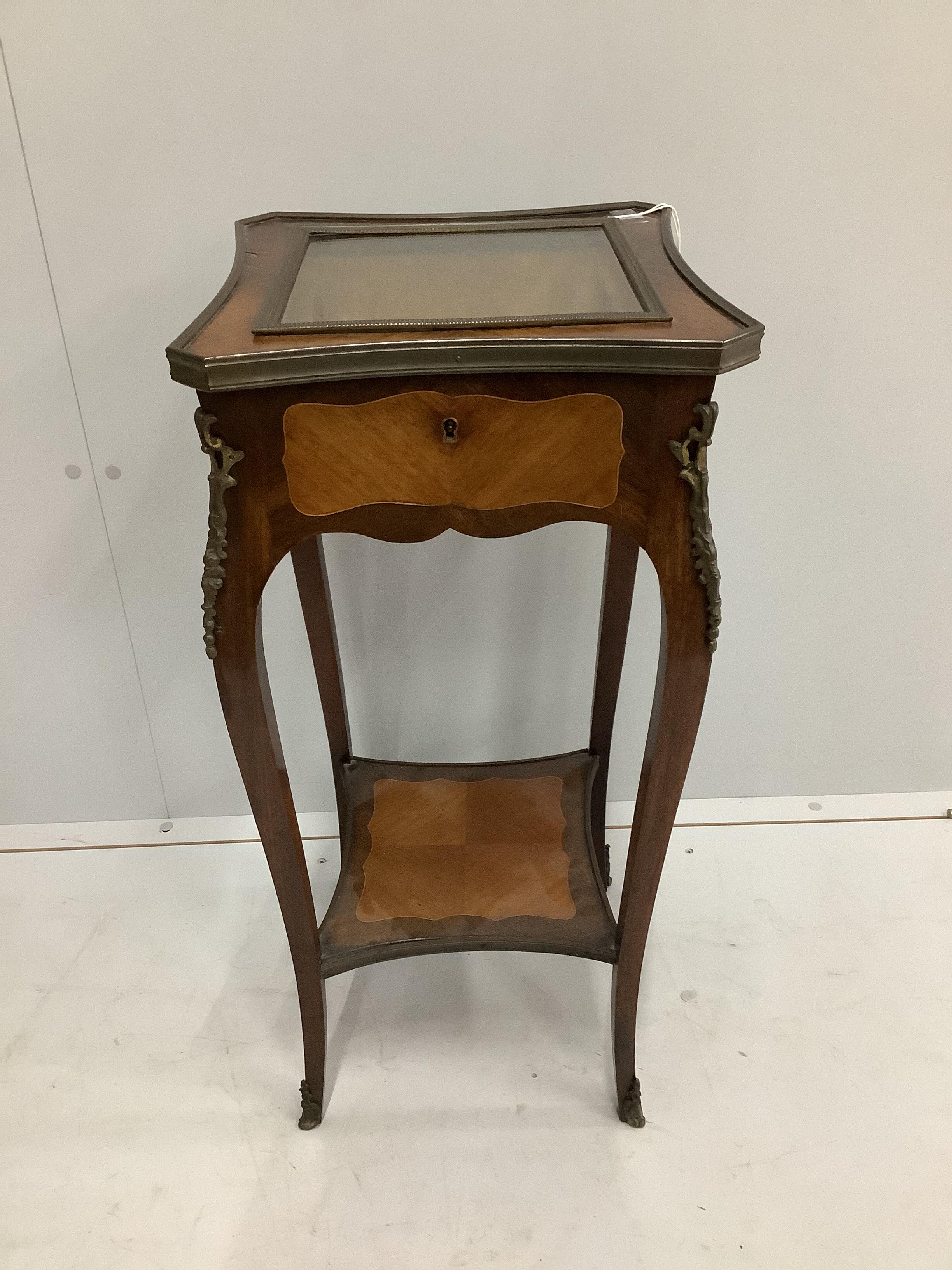 An early 20th century French gilt metal mounted kingwood bijouterie table, width 35cm, depth 35cm, height 74cm